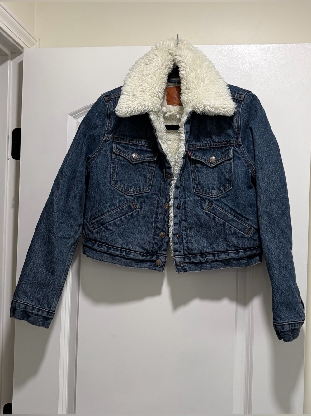 Levi's cropped
trucker jacket.